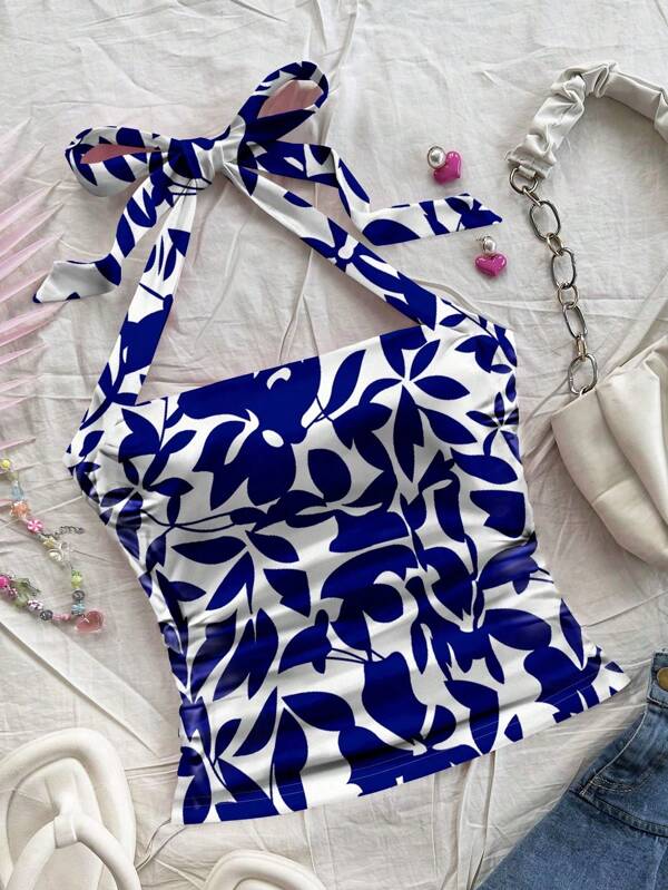 Soleia Parte superior de punto ajustada de mujer con cuello de lazo de color blanco, con estampado de hojas tropicales azules, adecuado para vacaciones de verano