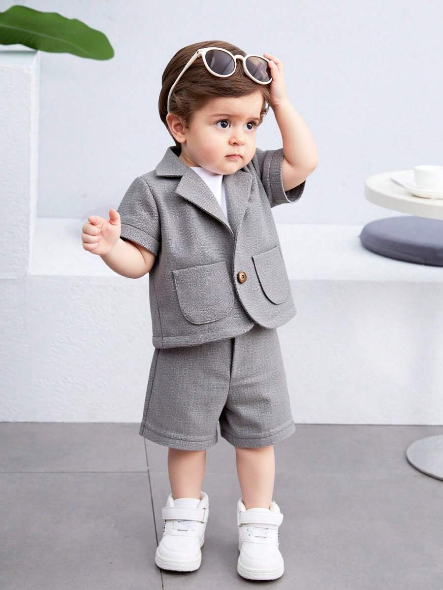 SHEIN 2pcs Baby Boy/Girl Casual Simple Solid Color Short Sleeve Blazer Jacket And Elastic Waist Shorts Set, Suitable For Summer