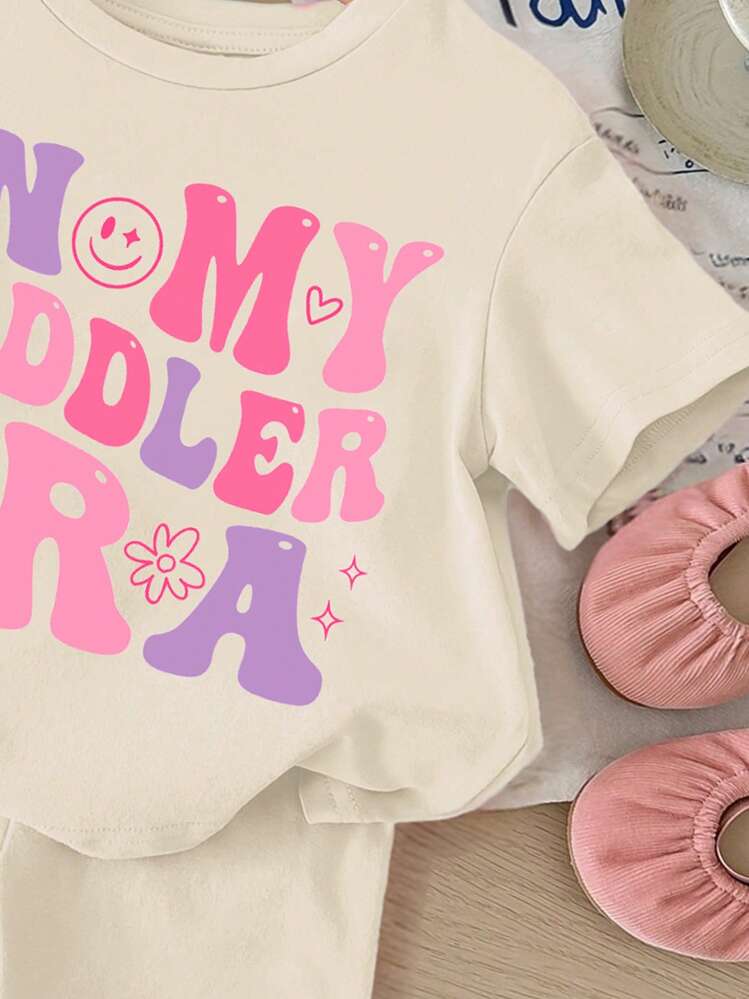 SHEIN Conjunto de camiseta de manga corta y pantalón corto con estampado de letras casual y sencillo para bebé niña, hecho de algodón apto para el verano - Albaricoque - Añade 4