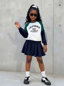 2 件套适合少女：拼布运动衫 + 百褶裙，校园风格复古美式印花，适合返校、派对、度假