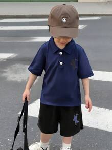 2pcs/Set Young Boys Loose Fit Polo Collar Short Sleeve T-Shirt With Horse Print, Matched With Black Casual Sports Shorts, Suitable For Spring And Summer Casual Wear, Travel And School