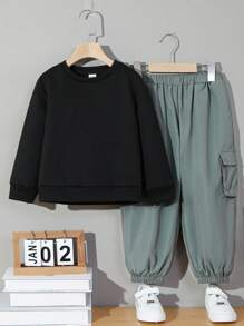 SHEIN Toddler Boys' Leisure Loose-fit Hat-wearing Skull Printed Sweater With Shoulder Bag And Side Pockets, Along With Tapered Pants With Prints