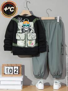 SHEIN Toddler Boys' Leisure Loose-fit Hat-wearing Skull Printed Sweater With Shoulder Bag And Side Pockets, Along With Tapered Pants With Prints