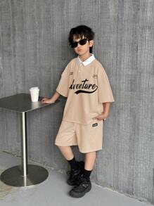 SHEIN Leap Crew 2 件青少年男孩休闲韩版时尚字母印花 Polo 领半拉链短袖上衣和宽松短裤套装，适合上学、海滩、生日、春夏季