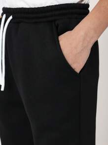 SUMWON Flare Joggers With White Side Panel Athletic Pants Retro Style Streetwear Training Performance Bottoms Winter Season Youth Sports Casual Sweatpants - Black - View 7