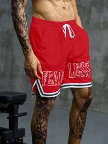 Manfinity Sport Corelite Pantaloncini sportivi da uomo con strisce a contrasto e stampa a lettera