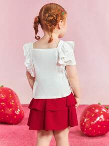 Strawberry Shortcake X SHEIN Set da ragazza giovane con top a maniche corte con grafica di cartoni animati carini e dolci, e gonna rossa a doppio strato
