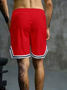Manfinity Sport Corelite Pantaloncini sportivi da uomo con strisce a contrasto e stampa a lettera