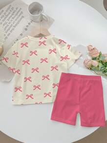 SHEIN Bộ đồ hai mảnh in nơ màu hồng dễ thương và ngọt ngào, màu hồng, áo phông tay ngắn đơn giản thường ngày cho bé gái tuổi teen, phù hợp cho mùa hè - Nhiều màu - Xem 3