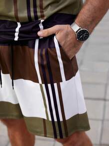 Manfinity Homme Conjunto de top de manga corta con estampado y shorts para hombre talla grande, ropa casual de moda simple para uso diario
