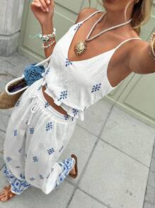 SHEIN Frenchy Bộ đồ hai mảnh thanh lịch màu xanh và trắng thêu họa tiết Totem quốc gia viền bèo nhún eo bó sát Bộ đồ lót và quần ống rộng Bộ đồ hai mảnh thanh lịch Bộ trang phục mùa hè cho phụ nữ Khách dự tiệc cưới mùa hè Bộ đồ đi biển cho phụ nữ Kỳ nghỉ Bohemia Quần áo mùa hè cho phụ nữ Trang phục sinh nhật cho phụ nữ Trang phục đi nghỉ Bộ đồ hai mảnh mùa hè cho phụ nữ Bộ quần áo mùa hè Boho cho phụ nữ Bộ đồ hai mảnh đi nghỉ Trang phục ăn trưa cho phụ nữ Quần áo phụ nữ Trang phục đi biển mùa hè Váy tiệc trà Mùa hè châu Âu Trang phục rave - Xanh và trắng - Xem 6