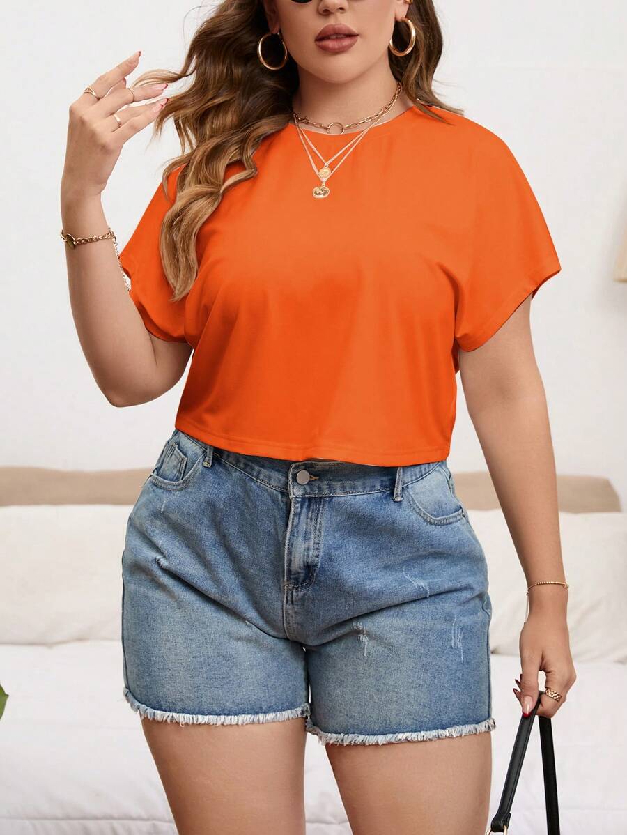 SHEIN Essnce Áo thun ngắn tay cánh dơi cổ tròn màu trơn cỡ lớn cho nữ - trái cam - Xem 1