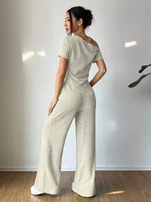 Flirla 2 pezzi/set, maglietta casual asimmetrica al collo + pantaloni a vita bassa a gamba ampia, abbigliamento da relax