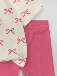 SHEIN Bộ đồ hai mảnh in nơ màu hồng dễ thương và ngọt ngào, màu hồng, áo phông tay ngắn đơn giản thường ngày cho bé gái tuổi teen, phù hợp cho mùa hè - Nhiều màu - Xem 5