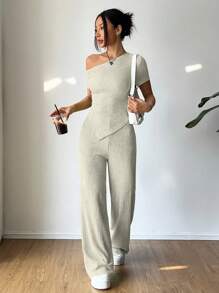 Flirla 2 pezzi/set, maglietta casual asimmetrica al collo + pantaloni a vita bassa a gamba ampia, abbigliamento da relax