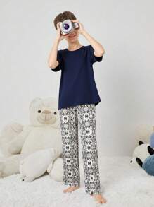 2pcs/Set Tween Boy Navy Blue Solid Color Round Neck Short Sleeve Top Paired With Patterned Long Pants, Fashionable & Comfortable Knit Fabric Short Sleeve Pajama Set - Multicolor - View 1