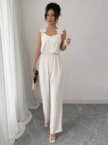 Chiquease 3D 珍珠装饰花卉连体裤，适合夏季的简约时尚设计