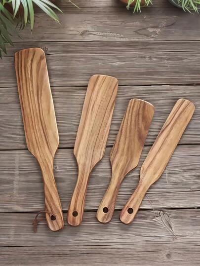 Zazumi 1 st träspade. Dessa köksapparater är tillverkade av kvalitetsträ som inte bara håller länge, utan också ger din matlagning en naturlig charm. Deras mjuka känsla garanterar komfort att använda, medan deras robusta konstruktion är idealisk för en mängd olika matlagningsuppgifter, från att vända pannkakor till att röra om såser. För dig som älskar snygga köksredskap är dessa träredskap ett måste för varje hemmakock.