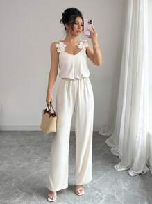 Chiquease 3D 珍珠装饰花卉连体裤，适合夏季的简约时尚设计