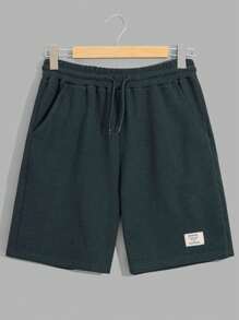 RueChic Conjunto de camiseta regular y pantalón corto de tela tipo gofre para hombres