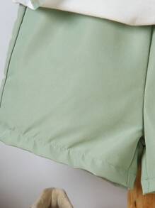 SHEIN Set de 2 piezas con camisa de manga corta con bloques de color y rayas y pantalones cortos para niño pequeño