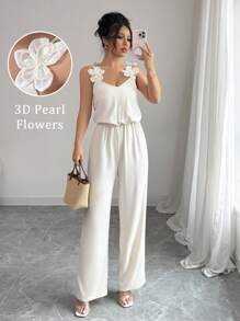 Chiquease 3D 珍珠装饰花卉连体裤，适合夏季的简约时尚设计