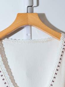 SHEIN LUNE Conjunto de dos piezas de talla grande para mujer con top de manga 3/4 de flores en contraste con adorno de encaje y pantalón de pierna ancha, para primavera/verano - Multicolor - Ver 4