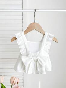 Blusa blanca casual y texturizada con lazo para bebés niñas, versátil para el verano