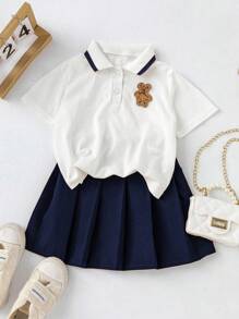 Elladie kids Young Girl 2pcs Set: Cartoon Bear Embroidered Short Sleeve Polo Shirt & Pleated Mini Skirt - Navy Blue - View 1