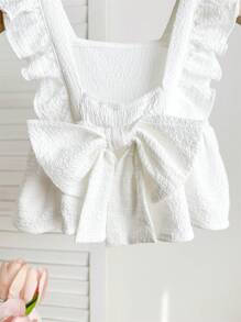 Blusa blanca casual y texturizada con lazo para bebés niñas, versátil para el verano