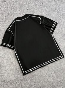 Manfinity Hypemode Camiseta de manga corta de cuello redondo holgada con líneas estructuradas de contraste, estilo callejero juvenil de los hombres, artículo versátil en INS, adecuado para ropa deportiva, usar de vuelta a la escuela y como regalo para novio.