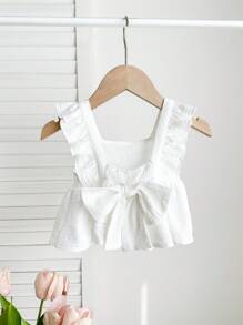 Blusa blanca casual y texturizada con lazo para bebés niñas, versátil para el verano