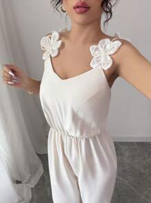 Chiquease 3D 珍珠装饰花卉连体裤，适合夏季的简约时尚设计