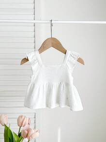 Blusa blanca casual y texturizada con lazo para bebés niñas, versátil para el verano
