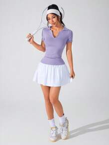 Dewbera Camiseta polo deportiva de mujer de manga corta con plisado en unicolor, de verano