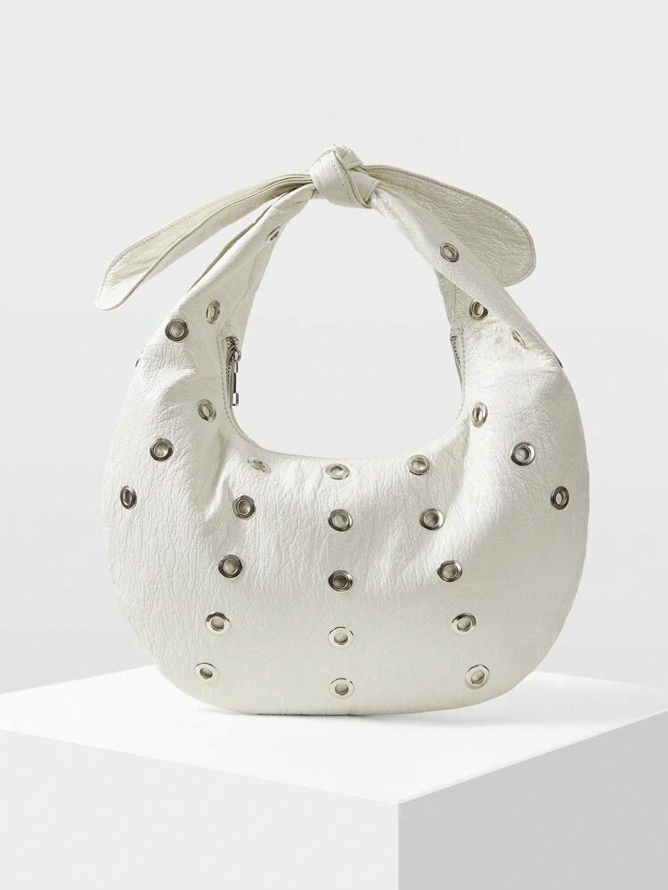 EYELET GROMMET TEXTURED KNOT TOP HANDLE BAG