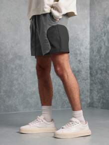SUMWON Pantalones cortos de entrenamiento atlético de rendimiento, pantalones cortos de trabajo con bolsillos laterales, de secado rápido y que absorben la humedad, de ajuste regular, para hacer ejercicio, correr, gimnasio y usar en verano