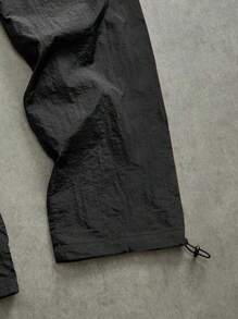 Manfinity Sport Corelite Pantalones deportivos de hombre con estampado de eslogan y dobladillo con cordón