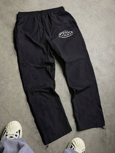 Manfinity Sport Corelite 男士休闲字母印花抽绳腰运动裤，秋季透气舒适宽松版型，适合健身房休闲穿着。