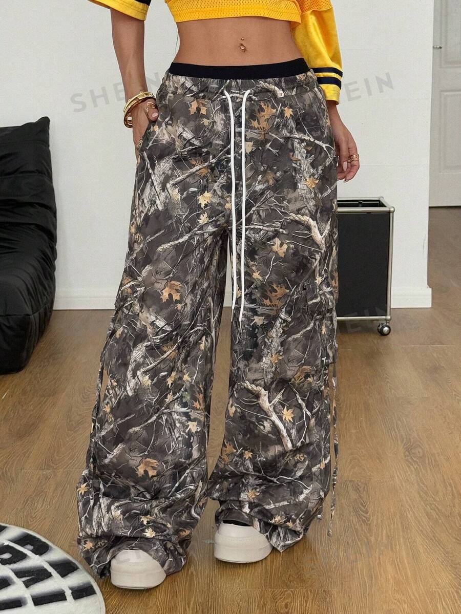 SHEIN EZwear Pantalones con bolsillos con estampado de ramas de primavera para mujer