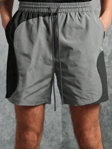 SUMWON Pantalones cortos de entrenamiento atlético de rendimiento, pantalones cortos de trabajo con bolsillos laterales, de secado rápido y que absorben la humedad, de ajuste regular, para hacer ejercicio, correr, gimnasio y usar en verano