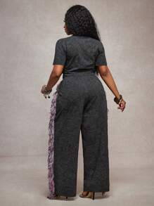 Slaydiva Conjunto de 2 piezas para mujer 2025 Nuevo, Vacaciones, Pascua, Graduación, Rave, Festival, Concierto, Fiesta de Cumpleaños, Casual Sexy: Top corto de manga corta con nudo delantero y pantalones largos holgados tipo maxi con bloques de color y flecos, Talla Grande Negro