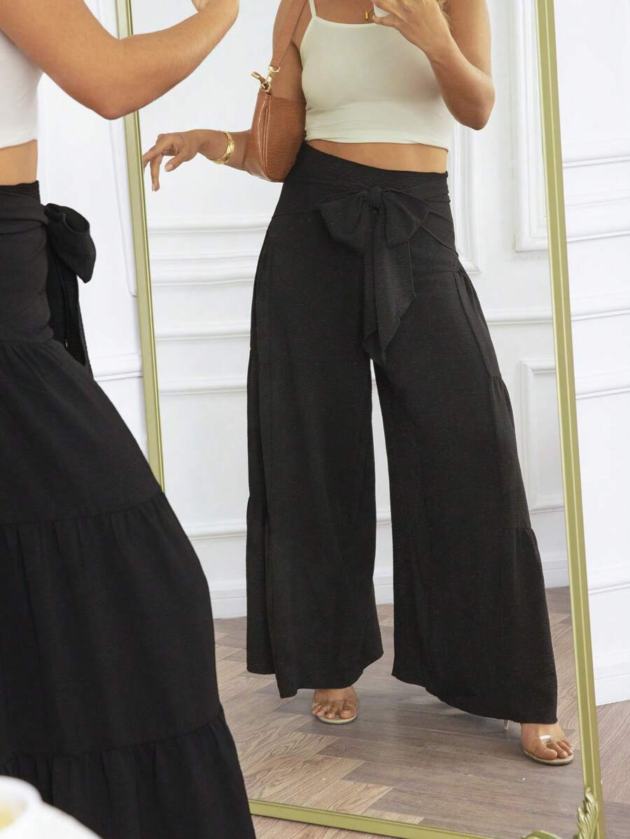 KURAYIA Pantalones anchos con cintura plisada y lazo delantero de mujer, estilo suelto para primavera y verano, ideal para vacaciones