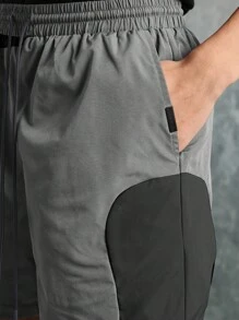 SUMWON Pantalones cortos de entrenamiento atlético de rendimiento, pantalones cortos de trabajo con bolsillos laterales, de secado rápido y que absorben la humedad, de ajuste regular, para hacer ejercicio, correr, gimnasio y usar en verano
