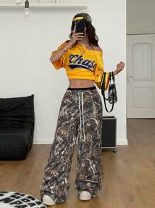 SHEIN EZwear Pantalones con bolsillos con estampado de ramas de primavera para mujer