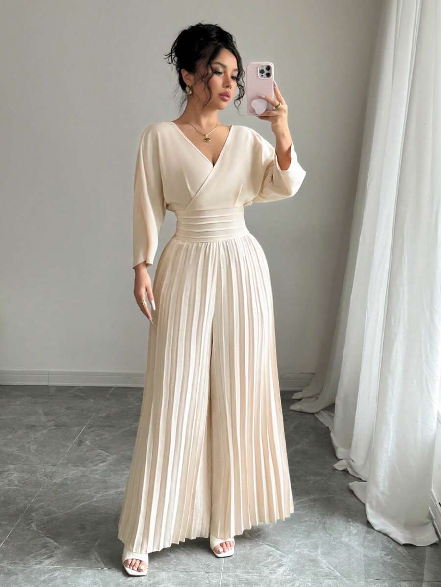 Rafferiza Women's Solid Color Overlapping V-Neck Batwing Sleeve Pleated Wide-Leg Jumpsuit - Apricot - View 1
