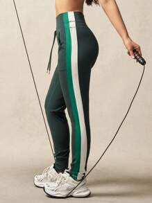 VARSIVA Women's Green Knitted Sports Leggings With Side Stripe And Pockets, Long Length, Non-Sheer Fabric For Comfortable Workout - Green - View 2