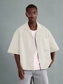 SUMWON Camiseta gráfica de declaración de estilo de vida boxy, estampado fuera de existencias, moda urbana casual de manga corta de verano y primavera moderna