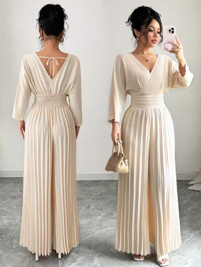 Rafferiza Damer i enfärgad överlappande V-ringad Batwing-ärm Plisserad jumpsuit med vida ben