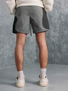 SUMWON Pantalones cortos de entrenamiento atlético de rendimiento, pantalones cortos de trabajo con bolsillos laterales, de secado rápido y que absorben la humedad, de ajuste regular, para hacer ejercicio, correr, gimnasio y usar en verano